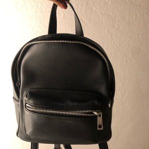 Cute little black backpack